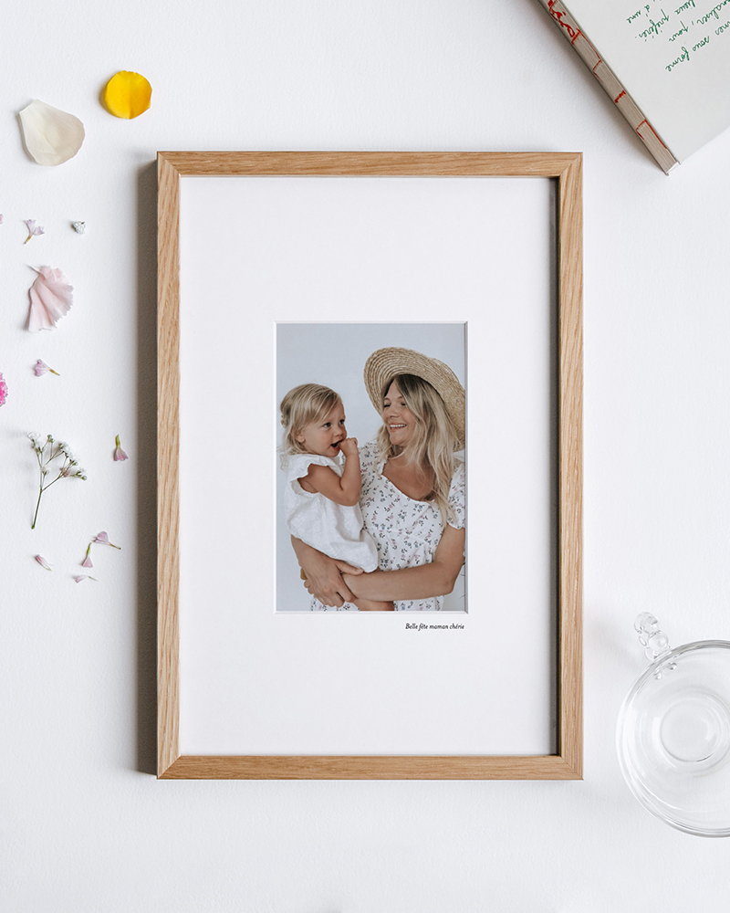 Cadre photo personnalisé avec une photographie de maman et bébé, ainsi qu'un petit message.